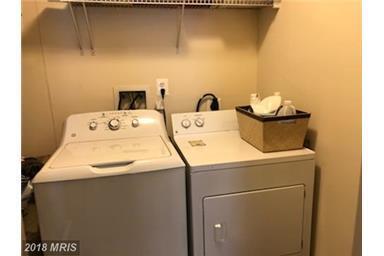 Building Photo - LUXURY 2 LEVEL END UNIT CONDO WITH WOOD FL...