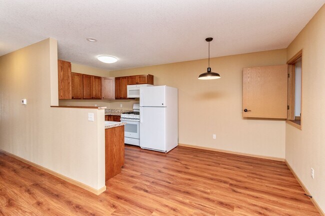Kitchen with dining area. Lots of storage. - 211 S Cottonwood St