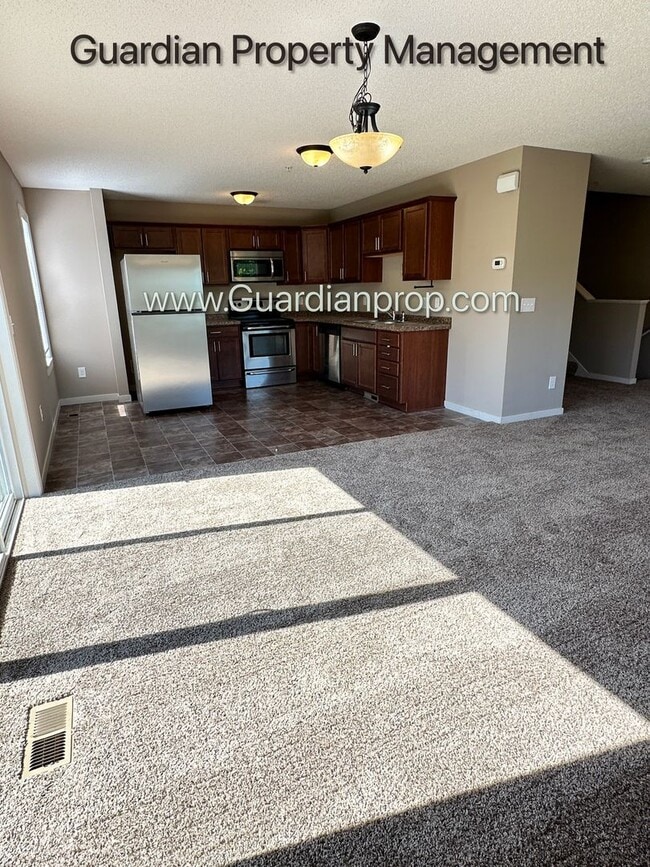 Building Photo - Champlin Corner Unit Town Home, 2 Car Garage, Dishwasher, Washer/Dryer, Balcony