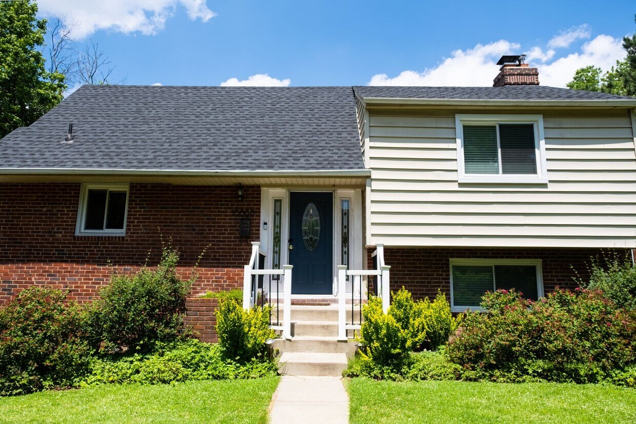 Primary Photo - Charming Split-Level Home with Bright Inte...