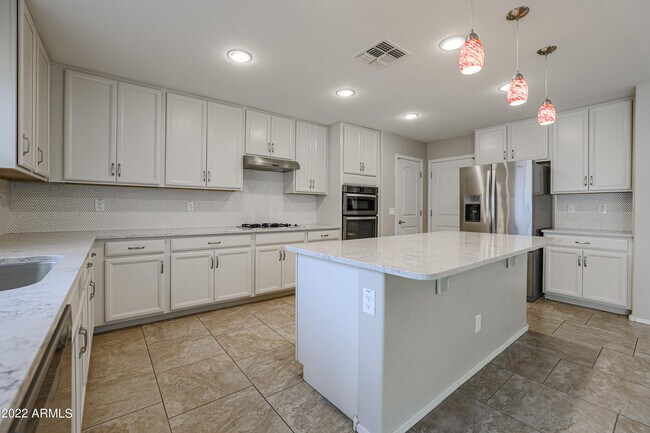 Building Photo - 12108 W Range Mule Dr