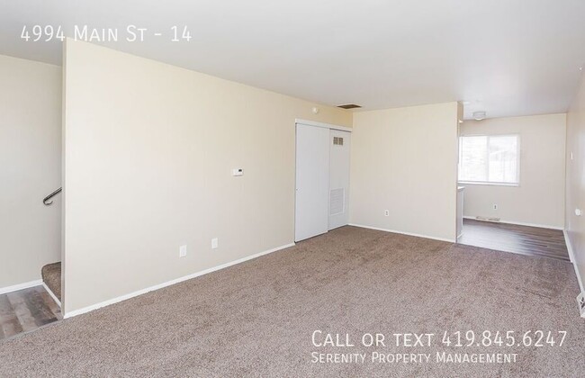 Building Photo - Fall In Love With This Two bedroom Townhom...