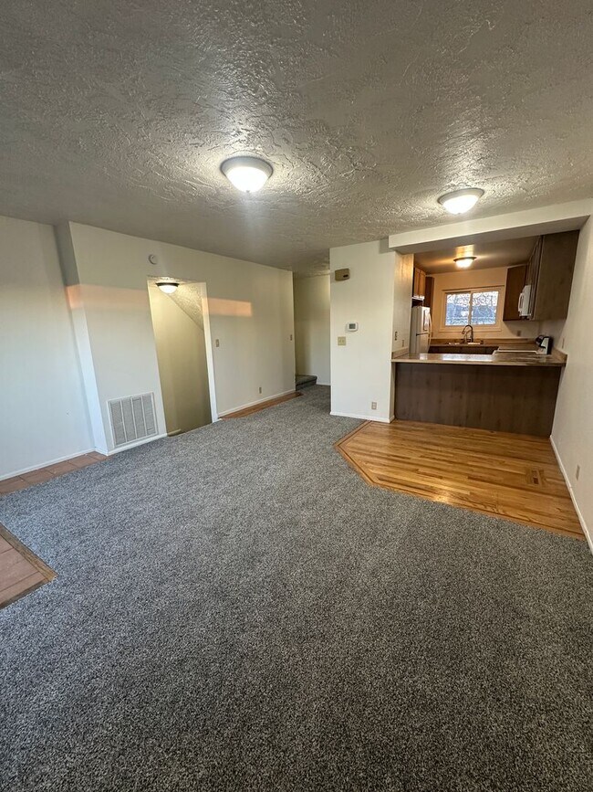Building Photo - $500 OFF OF FIRST MONTHS RENT!!! - Spacious, three level, 4 Bed 2.5 bath Townhome in Ammon right ...