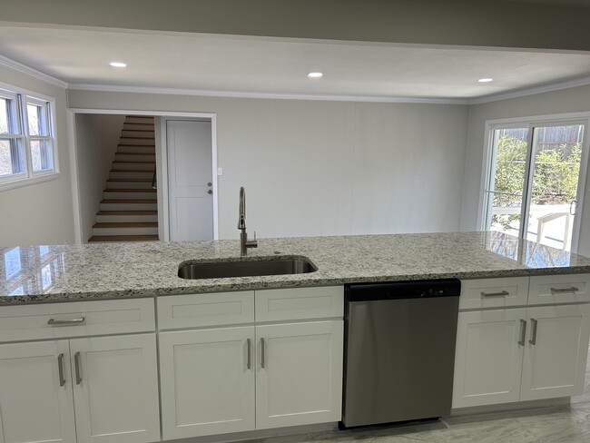 View from Kitchen into Dining Room and stairs to new Master Bedroom - 3404 Martin Lydon Ave