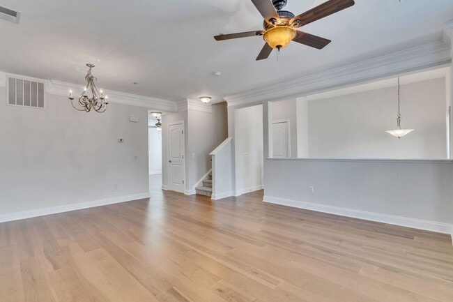 Building Photo - Spacious End Unit with Garage in Gated Com...