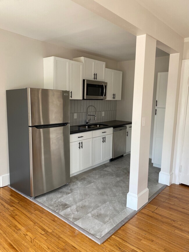 Newly renovated kitchen - 324 E 8th St