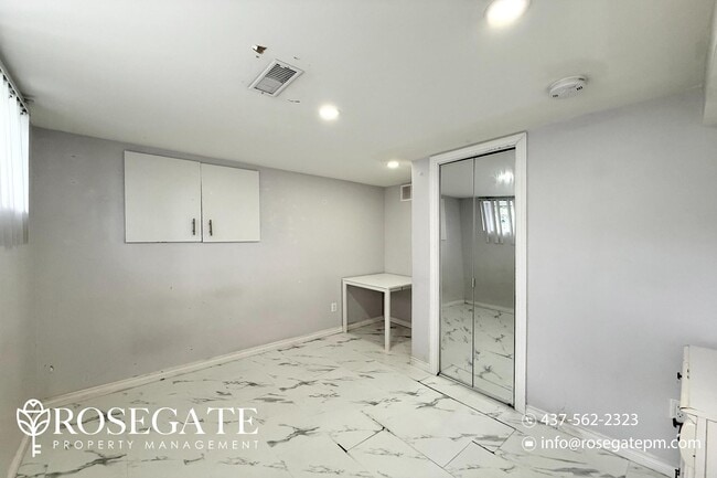 Photo du bâtiment - Affordable 1-Bedroom Basement Unit in Scar...