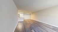 This contemporary apartment in Arbor Park of Alexandria offers 1000 square feet of thoughtfully designed living space. The open-concept floor plan seamlessly integrates the kitchen, living, and dining areas, creating a spacious and airy atmosphere. The kitchen is a highlight, featuring sleek white cabinetry, stainless steel appliances, and a convenient island with seating.

Two generously sized bedrooms provide ample space for rest and relaxation. The primary bedroom, measuring 180 square feet, is particularly noteworthy. Both bedrooms are equipped with ceiling fans and large windows that allow natural light to flood the space.

The apartment boasts two full bathrooms, each appointed with modern fixtures and neutral-toned tile work. The combination of carpet in the bedrooms and wood-look flooring in the main living areas adds warmth and texture to the space.

Throughout the apartment, recessed lighting and ceiling fans contribute to the overall comfort and ambiance. The neutral color palette and clean lines create a fresh, contemporary feel that serves as a perfect backdrop for any decor style.