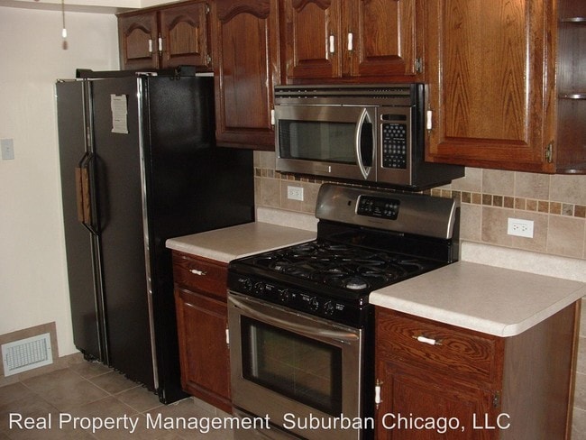 Building Photo - 3 br, 2.5 bath House - 459 N Wolf Road