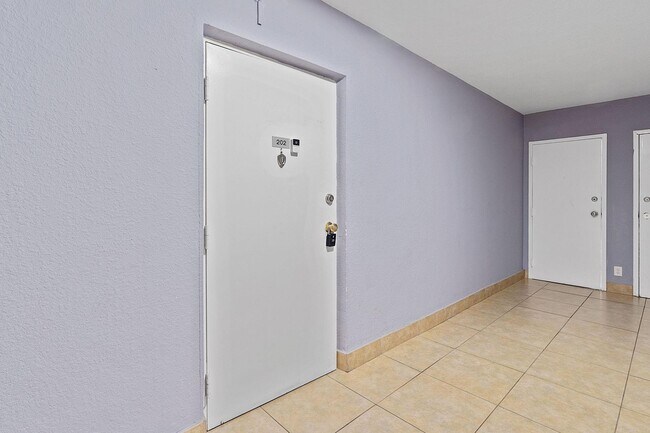 Building Photo - 1060 Crystal Lake Dr Unit 202
