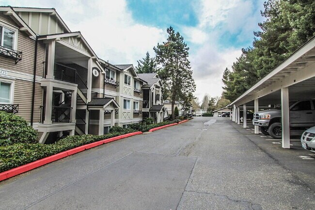 Building Photo - Clean, Updated Ground Floor 1 Bedroom Condo in Excellent Kirkland Location. 2 Reserved Parking Sp...
