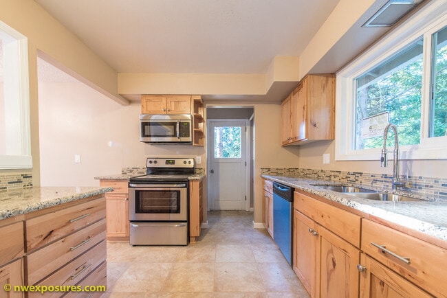Building Photo - Charming 4-Bedroom Home with Dual Decks an...