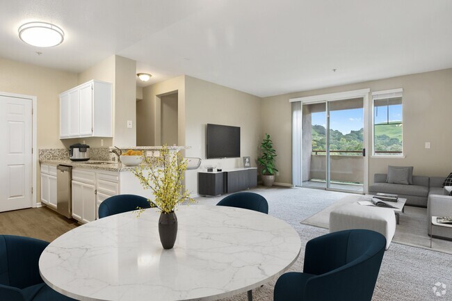 Open concept living and dining areas. - Bollinger Crest