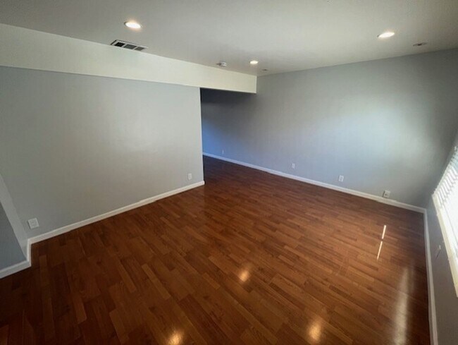 Building Photo - PETS OK!  2-story townhome with 2 bedrooms...