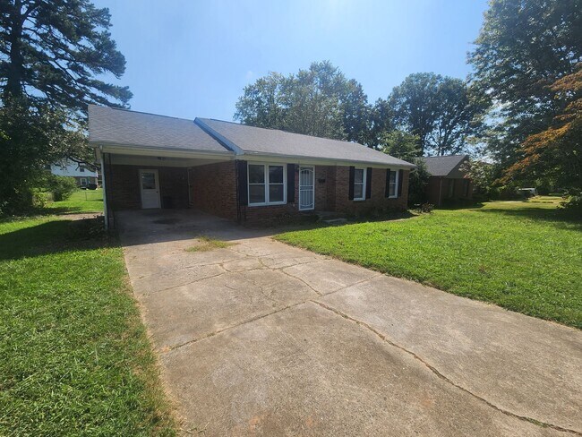 Building Photo - Three bedroom home near Winston Lake