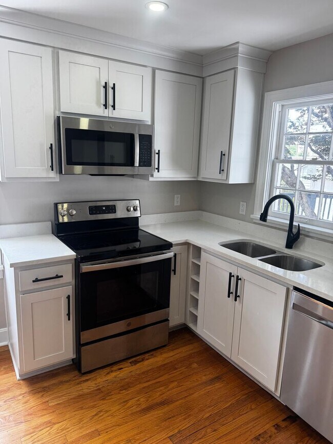 Building Photo - Fully Updated 3BR/2BA St. Matthews Cape Cod with Garage & Wrap-Around Deck