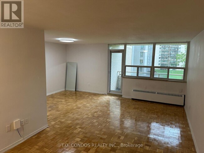 Photo du bâtiment - 360-360 Ridelle Ave