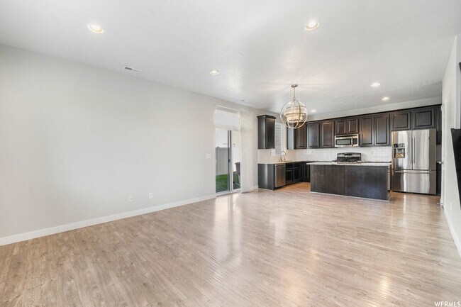 living room and kitchen - 929 W Stonehaven Dr