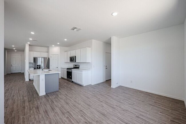 Building Photo - HOME IN LAVEEN! 4 BED 3.5 BA 3 CAR GARAGE!...