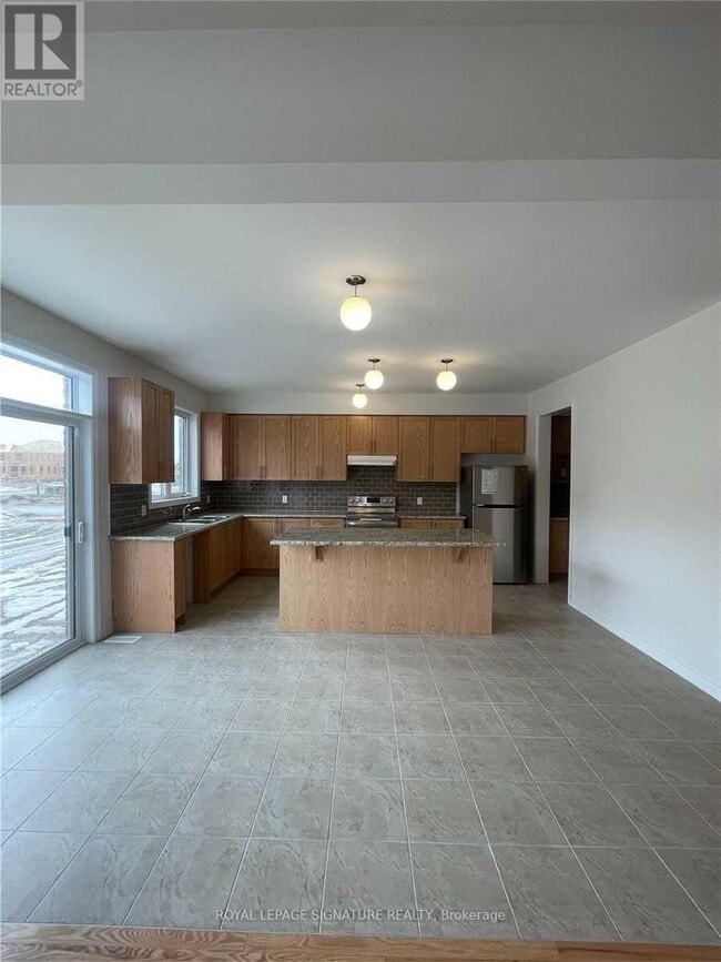 Building Photo - 404 Black Cherry Cres
