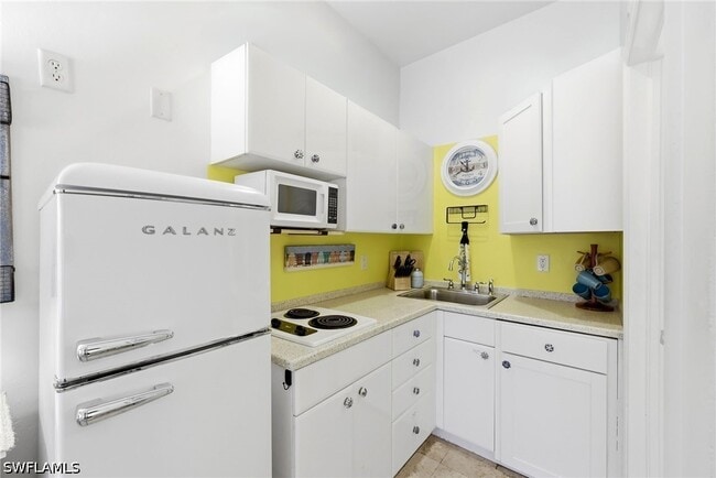 Building Photo - 25000 Tamiami Trl E
