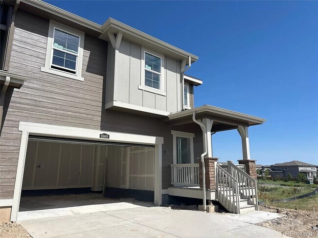 Front view of the home - 8969 Spikerush Ct Townhome