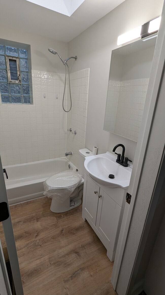 New bathroom, floors and vanity - 1540 N Paulina St