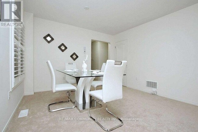 Building Photo - 223 Windfields Farm Dr W