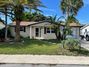 Building Photo - 7040 Brentwood Dr
