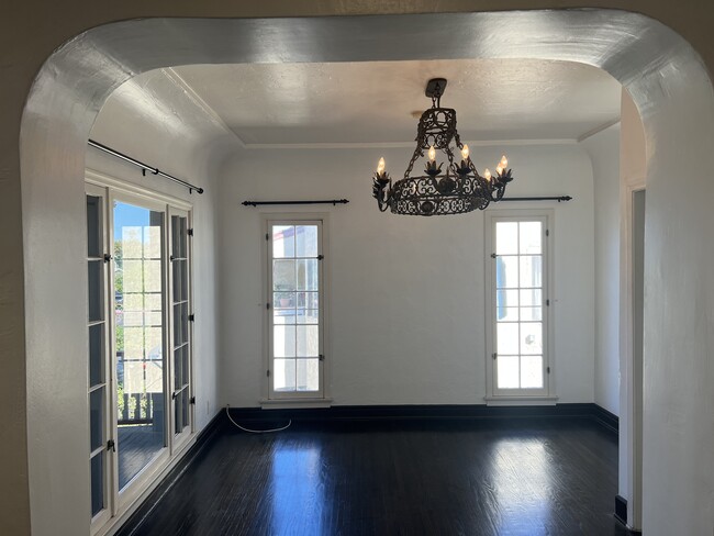 Antique iron chandelier in formal dining area - 1614 Cimarron St