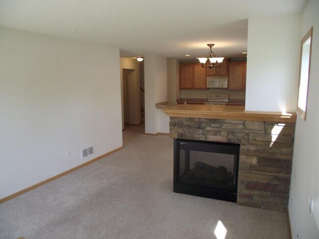 Gas fireplace in living room - 10827 Kingsfield Ln
