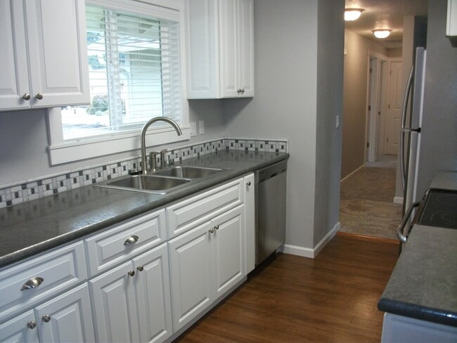 Building Photo - Inviting 3-Bedroom Home with Workshop/Storage and Outdoor Space