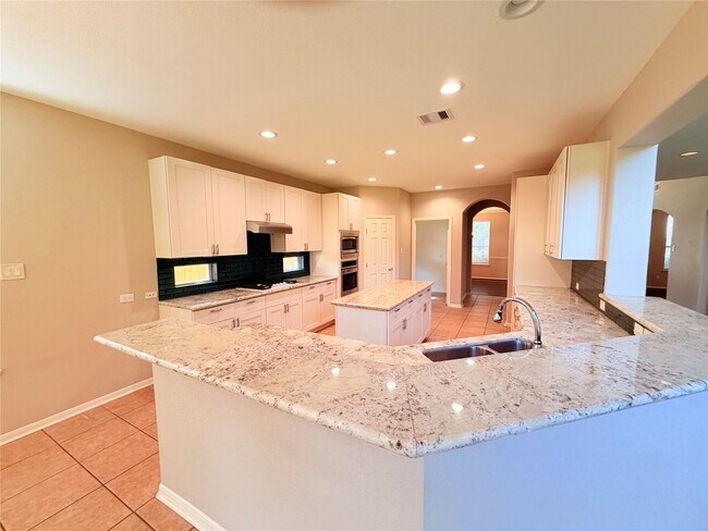 Foto del edificio - 5206 Riverstone Crossing Dr