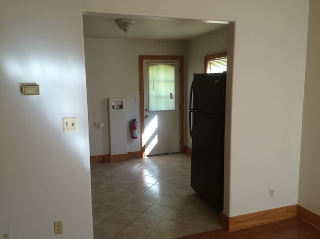 Livingroom to kitchen with Laundry hookups for a stackable washer / dryer in kitchen - 14740 Chamberlain Street