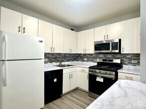 Building Photo - 45 River Dr S