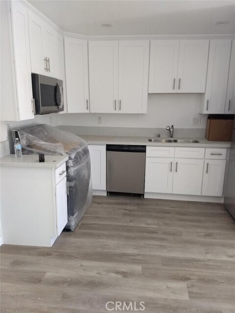 Foto principal - 9611 Olive St