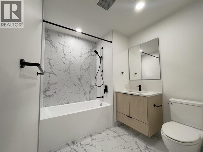 Photo du bâtiment - 402-402 E 3rd St