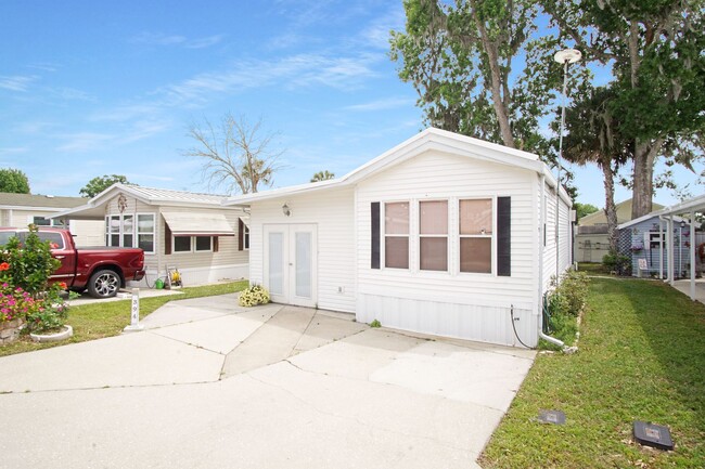 Building Photo - Home in 55+ Community now available!