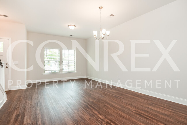 Building Photo - Gorgeous Brand New Townhome!
