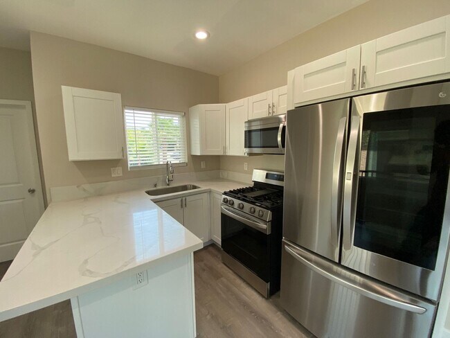 Building Photo - NEW (2023) 4BD/2BA!! Back gate exits right...