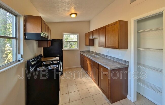 Building Photo - 7150 Eudine Dr S