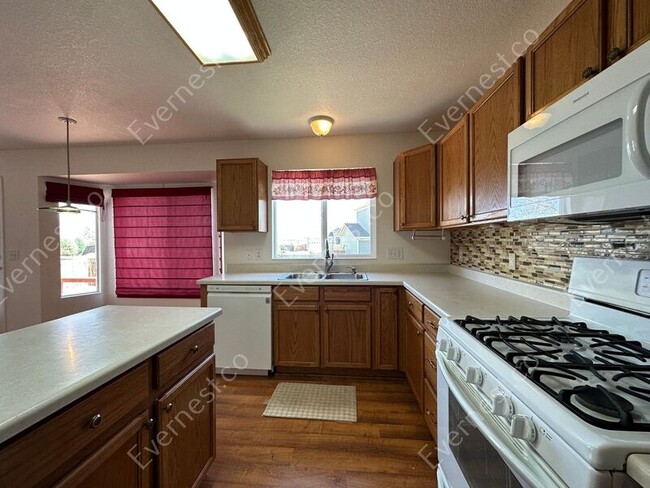Foto del edificio - 6431 E 114th Ave