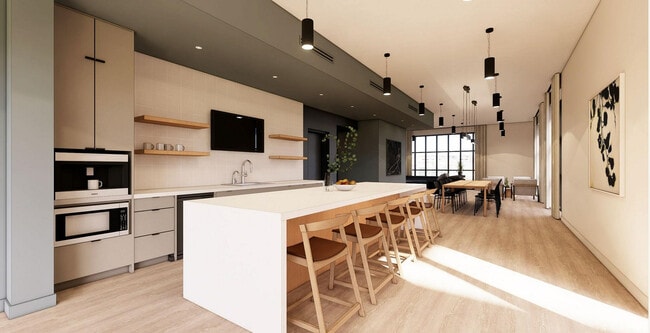 Experience luxury in a modern kitchen and dining area designed for social gatherings and family meals. - The 1785 Club Athens Apartments