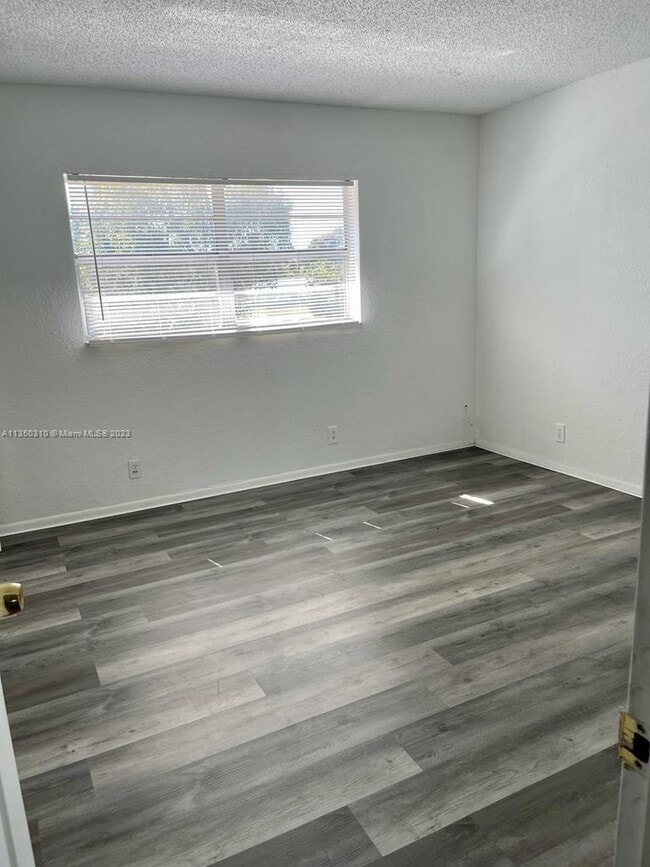 Building Photo - 4750 NW 9th Dr