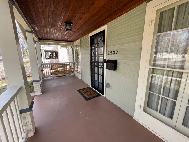 Front porch with swing - 1507 N El Paso St