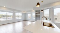 Step into a world of possibilities in this exquisite 1,010 sq ft residence. The moment you enter, you'll be captivated by the seamless flow of light and space, creating an atmosphere of endless potential. The heart of this home is the expansive living area, where gleaming wood-look flooring and large windows invite natural light to dance across the room, setting the stage for unforgettable gatherings with friends and family.

The primary bedroom, a generous 170 sq ft retreat, promises restful nights and inspiring mornings. Imagine waking up to scenic views through the large windows, ready to embrace each day with renewed energy. The second bedroom offers versatility as a guest room, home office, or personal sanctuary, adapting to your evolving needs.

Both bathrooms exude modern elegance, featuring sleek white fixtures and ample storage. The shower area, with its pristine white surround and contemporary fixtures, offers a spa-like experience to start and end your day in luxury.

Throughout the home, recessed lighting and carefully placed windows create a bright, airy ambiance, while plush carpeting in select areas adds warmth and comfort underfoot. Built-in shelving and closet spaces provide smart storage solutions, keeping your living spaces clutter-free and organized.

This home isn't just a place to live; it's a canvas for your aspirations. Whether you're hosting dinner parties, working from home, or simply enjoying quiet moments of reflection, every corner of this thoughtfully designed space supports your lifestyle goals. Located in the heart of Farmington, MN, you're perfectly positioned to enjoy the best of suburban living with easy access to urban amenities. Your journey to an inspired life starts here – welcome home.