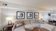 Located at 100 Fox Meadow Dr in Maple Shade, NJ, this one-bedroom, one-bathroom residence offers a thoughtfully designed single-floor layout that maximizes functionality and comfort. The living room serves as the heart of the home, featuring soft wall-to-wall carpeting, a sliding glass door that fills the space with natural light and provides access to an outdoor area, and a warm, neutral color palette throughout. The kitchen is efficiently laid out with dark wood cabinetry, light countertops, wood-look vinyl flooring, and includes a dishwasher and full-size refrigerator, providing ample workspace for everyday cooking. Adjacent to the kitchen, the dining room offers a dedicated space for meals, connected seamlessly to the main living area. The generously sized primary bedroom features plush carpeting, a large window with blinds for natural light and privacy, and direct access to a dedicated closet, offering practical storage. The full bathroom is clean and bright, featuring a tiled shower-tub combination, wood-look vinyl flooring, and crisp white finishes. A hallway connects all areas of the residence, contributing to an efficient and cohesive flow throughout the home.