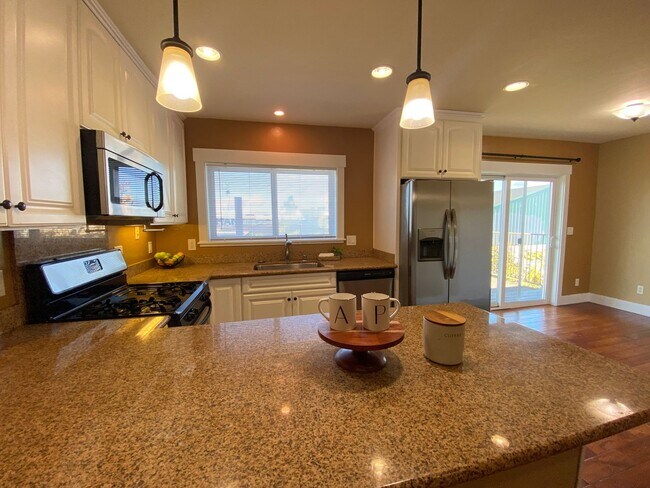 Building Photo - Advent- Top Floor Condo W/ In Unit Laundry...