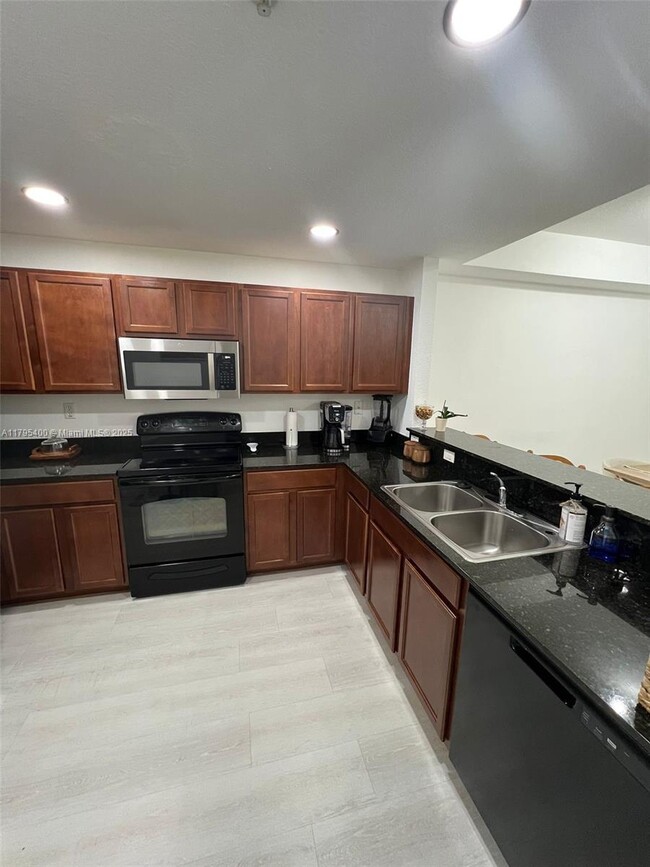 Building Photo - 8899 NW 107th Ct