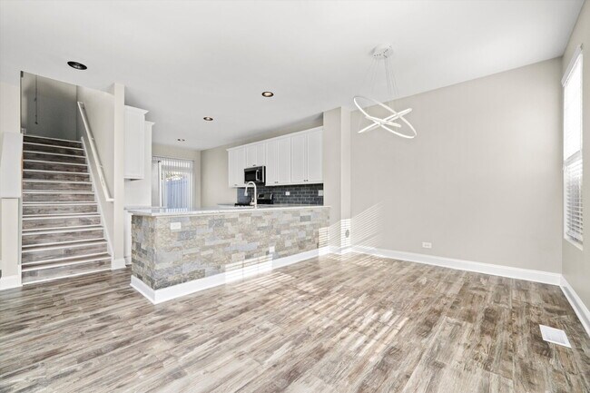 Building Photo - Modern 3-Bed, 2.5-Bath Townhome with Pond ...